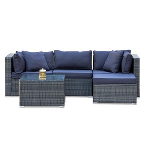 Eimeo grey wicker outdoor corner lounge set in an outdoor setting