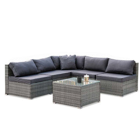 Eimeo grey wicker outdoor corner lounge set in an outdoor setting