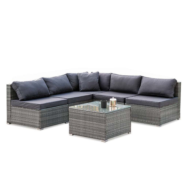 Eimeo grey wicker outdoor corner lounge set in an outdoor setting