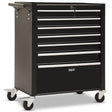 Black 7 drawer steel tool chest with open drawers in a garage workshop