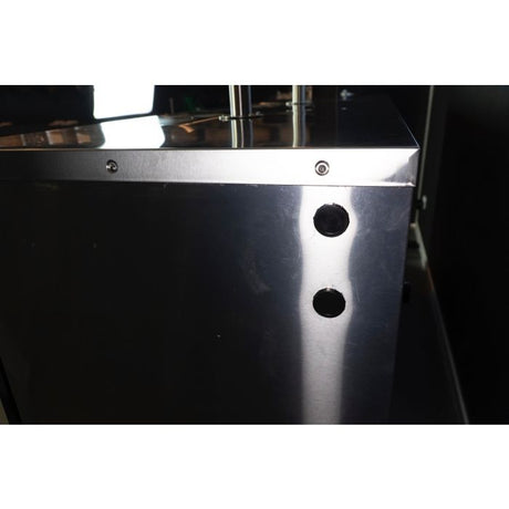 Slide out compressor assembly of the three door commercial keg fridge