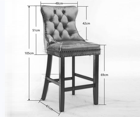 Ranelagh black velvet bar stool with silver stud trim and wooden legs in a dining room