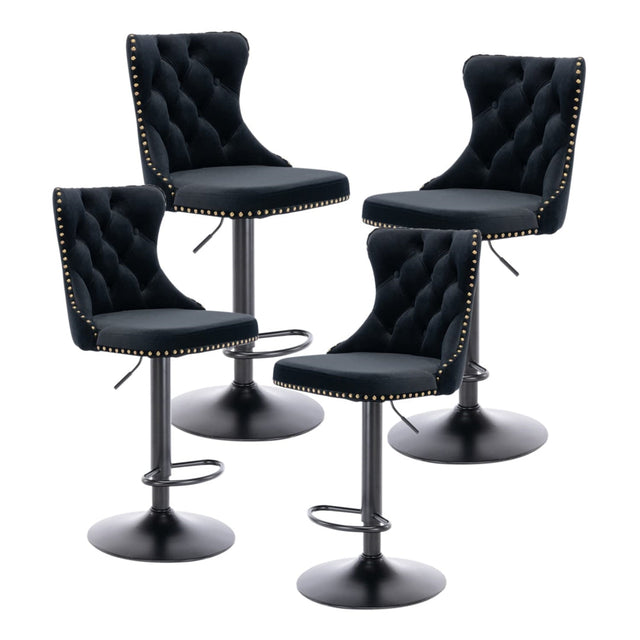 Kilcunda black velvet tufted swivel bar stool with nailhead trim in a modern kitchen