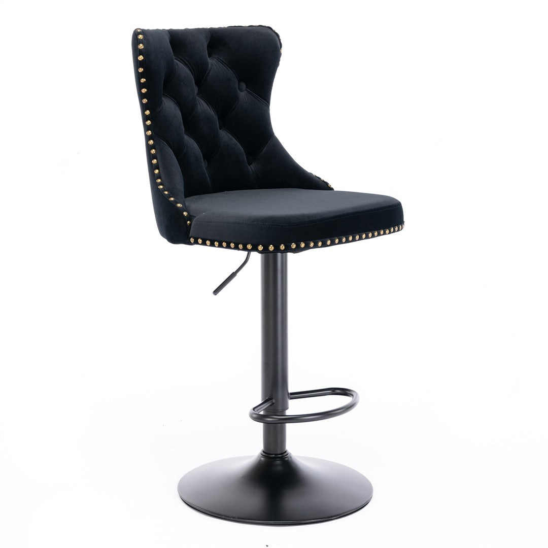 Kilcunda black velvet tufted swivel bar stool with nailhead trim in a modern kitchen