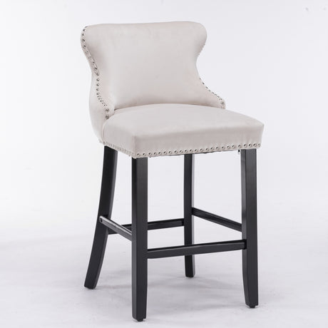 Velvet tufted bar stool seat and wooden leg detail close-up — Allure Home Collections
