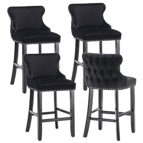 Silverleaves button tufted velvet bar stool black in a modern kitchen