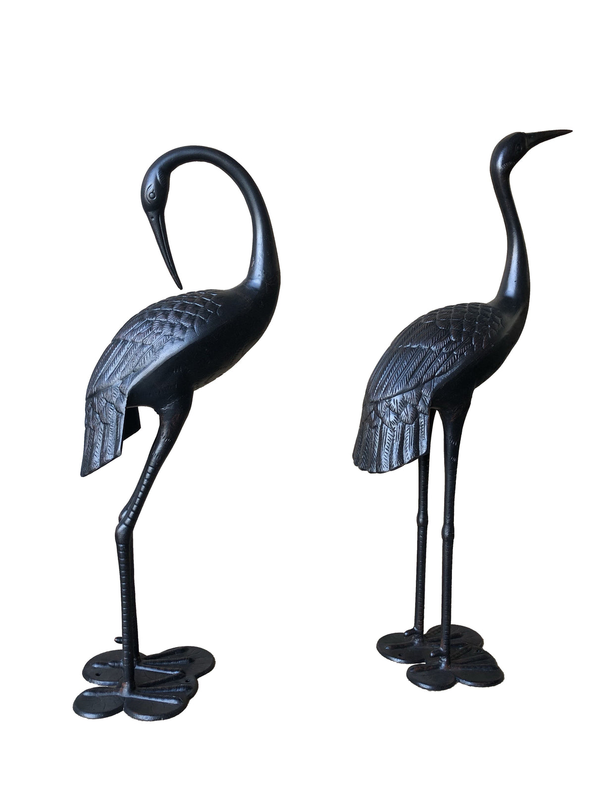 Male and female garden crane statues