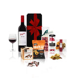 Bayonne Shiraz and gourmet sweets gift hamper with iconic Australian red wine, nougat, and rocky road in a black magnetic gift box with red bow
