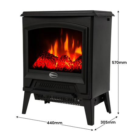 Electric stove positioned inside a standard fireplace opening