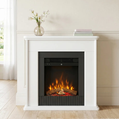 White electric fireplace suite styled against a lounge room feature wall