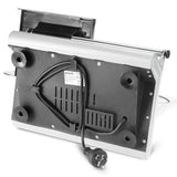 White electric food slicer cutting thin slices of meat