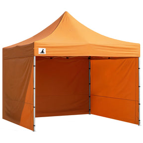 Orange pop up gazebo 3 x 3 m set up on grass with the roof extended
