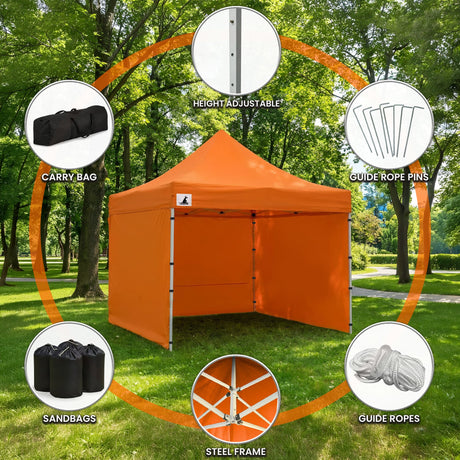 Two people expanding the orange gazebo frame during setup
