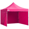 Pink pop up gazebo 3 x 3 m set up on grass with the roof extended