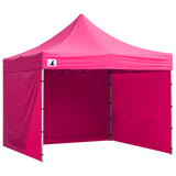 Pink pop up gazebo 3 x 3 m set up on grass with the roof extended