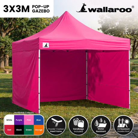 Side view of the pink folding marquee showing the valance and steel legs