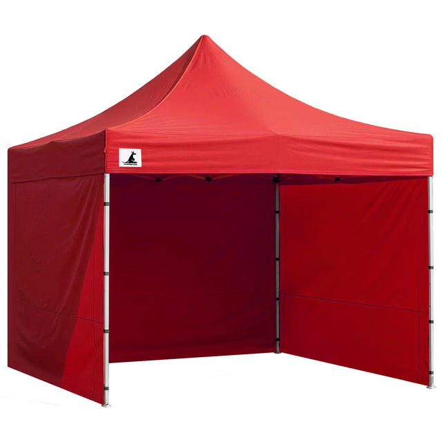 Red pop up gazebo 3 x 3 m set up on grass with the roof extended