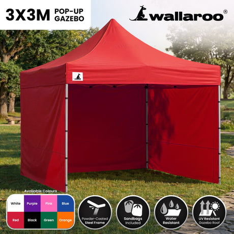 Side view of the red folding marquee showing the valance and steel legs