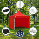 Two people expanding the red gazebo frame during setup