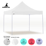 Zip up door panel of the white gazebo tied open for guests to walk through