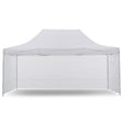 White pop up gazebo 3 x 4.5 m set up on grass with the roof extended
