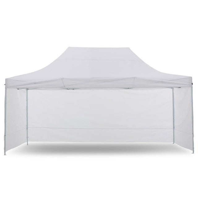 White pop up gazebo 3 x 4.5 m set up on grass with the roof extended