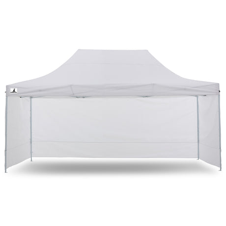 Zip up door panel of the white gazebo tied open for guests to walk through
