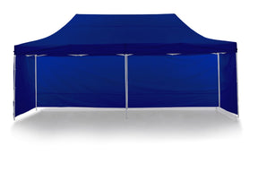 Blue pop up gazebo 3 x 6 m set up on grass with the roof fully extended