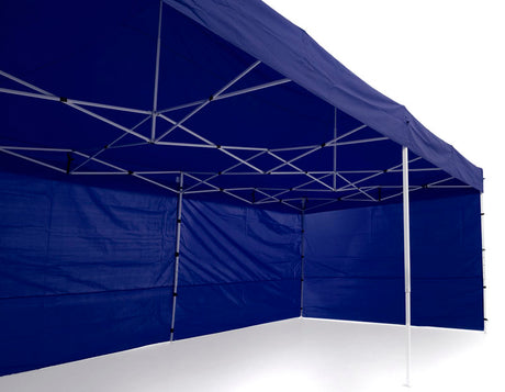 Fly screen wall panel fitted to the blue marquee for airflow without insects