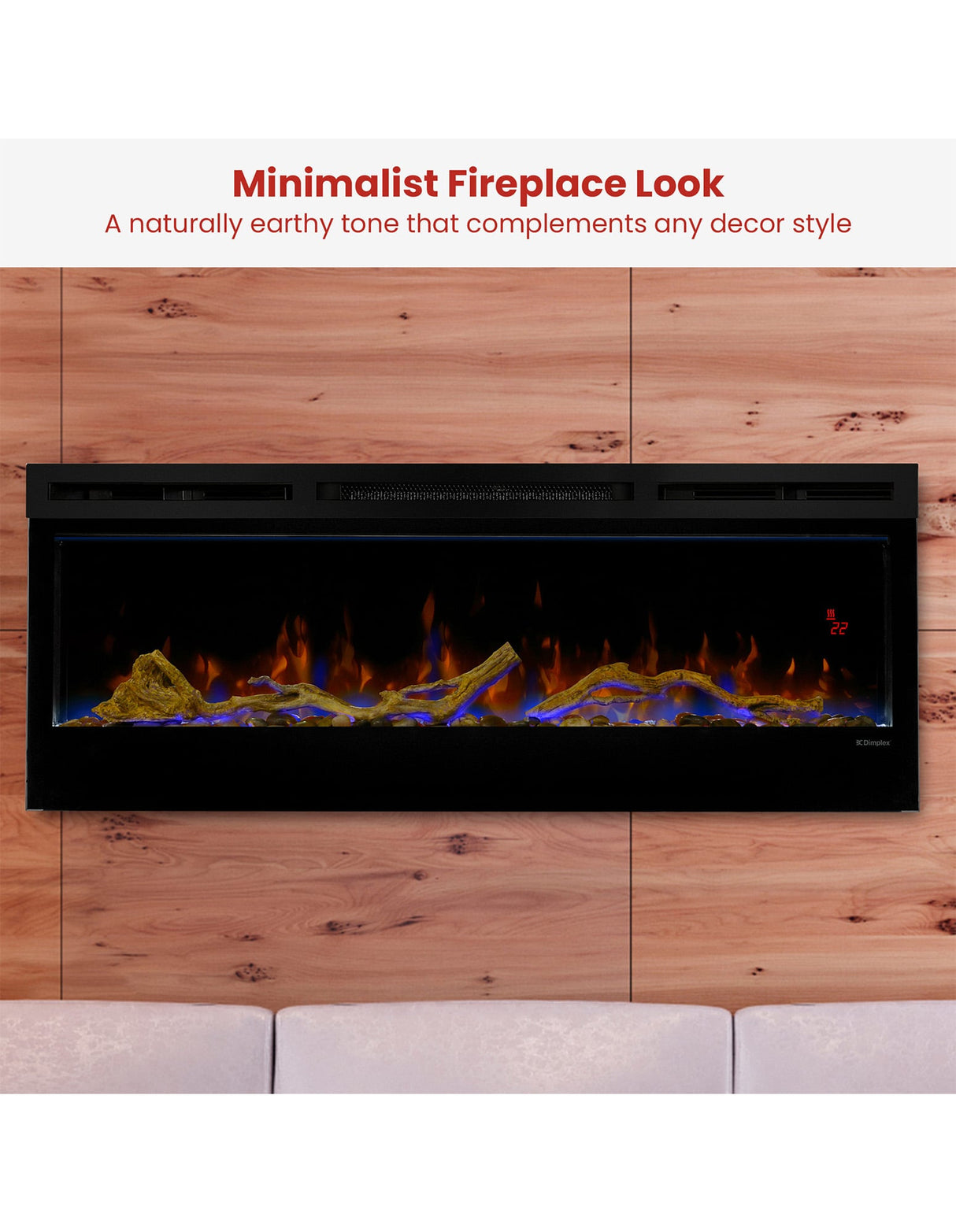 Flame effect rising between driftwood and river rocks in a linear fireplace