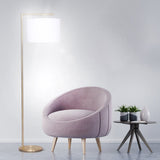 Modern arc floor lamp with brass finish and white drum shade