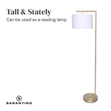 Modern arc floor lamp with brass finish and white drum shade