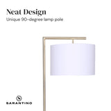 Modern arc floor lamp with brass finish and white drum shade
