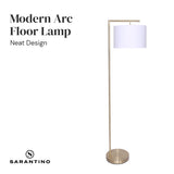 Modern arc floor lamp with brass finish and white drum shade