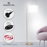 Modern arc floor lamp with brass finish and white drum shade
