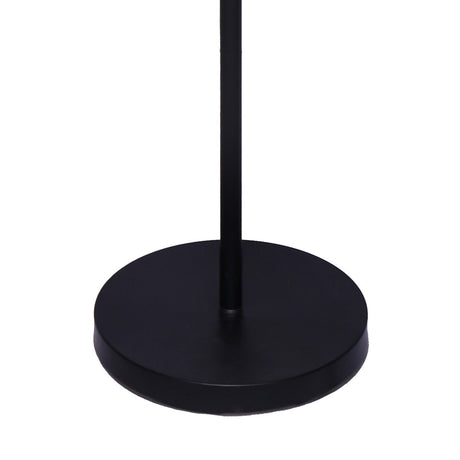 Industrial four arm floor lamp with exposed bulbs in antique brass and matte black