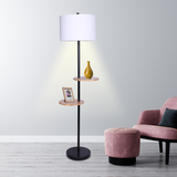 Metal floor lamp with round wood shelves and white drum shade