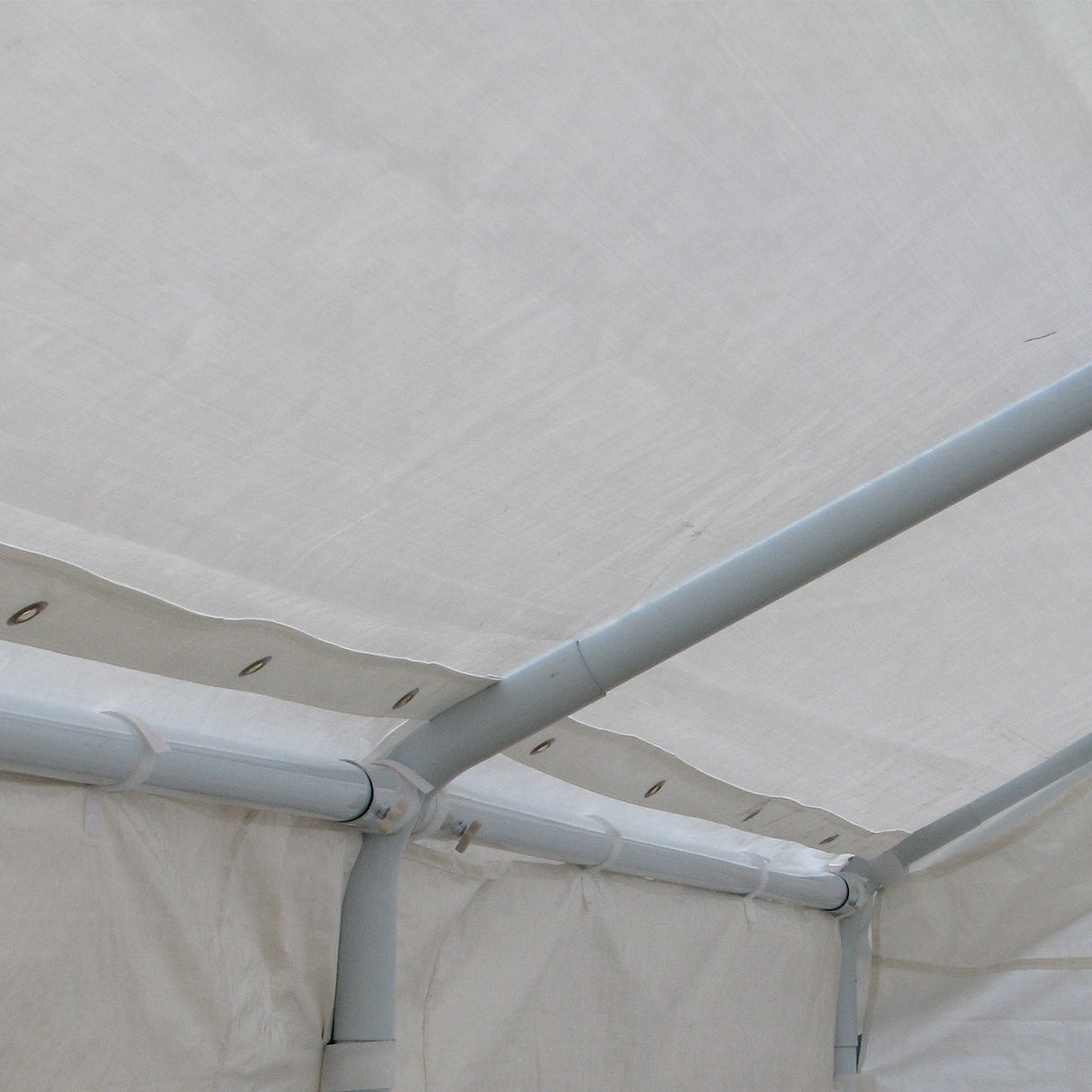 Corner detail of the marquee roof cover showing an eyelet tie point
