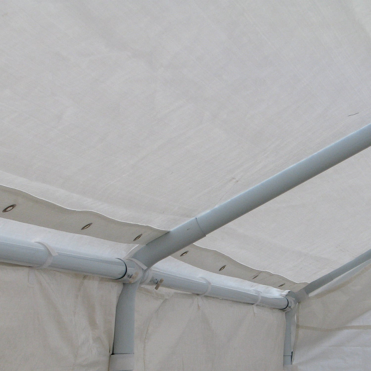 Corner detail of the marquee roof cover showing an eyelet tie point