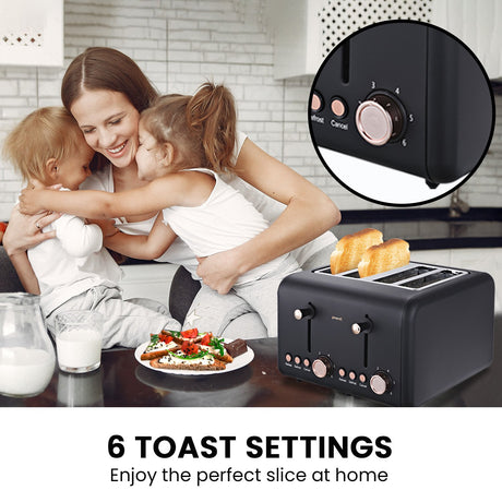 Removable crumb tray sliding out of black 4 slice toaster