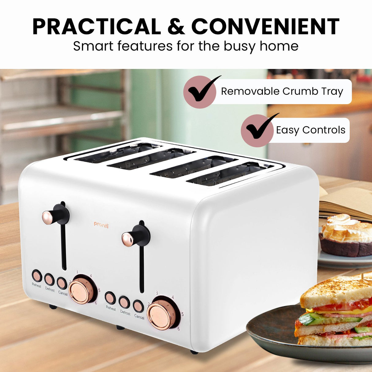 Rose gold trim detail on matte white family sized toaster