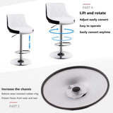 Two white leather swivel bar stools at kitchen counter — Allure Home Collections