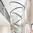 Vernazza black five ring LED chandelier in a modern living room