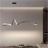 LED linear pendant light detail showing slim black fixture