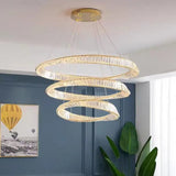 Gold three ring chandelier with integrated LED light strip