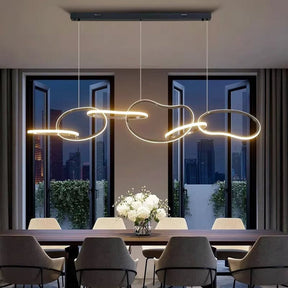 Levanto black adjustable interlocking ring pendant above a dining table