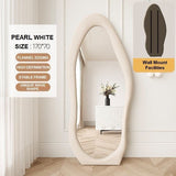 Skenes Creek pearl white wavy full length floor mirror in a modern bedroom