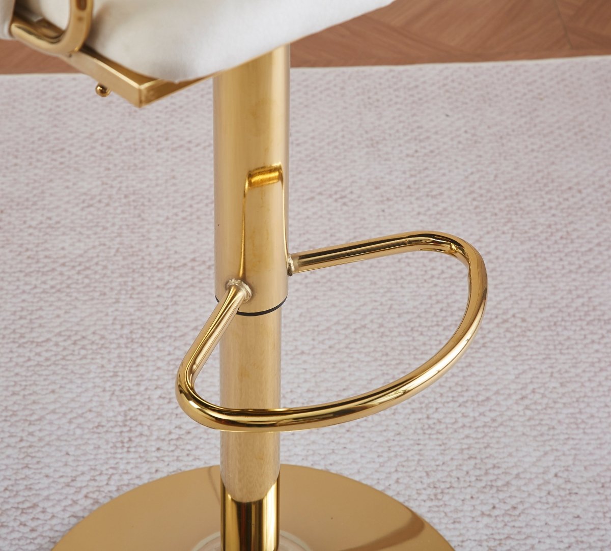Two velvet bar stools with gold base at white kitchen counter — Allure Home Collections