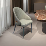 Williamstown grey faux leather dining armchair in a modern dining room