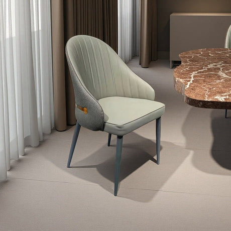 Williamstown grey faux leather dining armchair in a modern dining room
